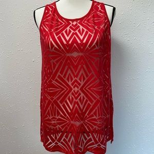 Get festive ready with this bright red geometric tank.